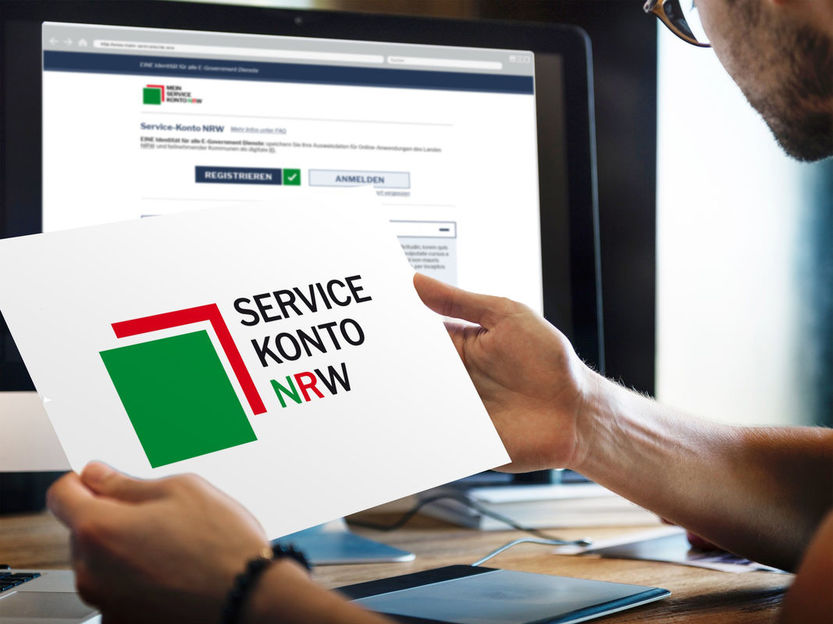 Logo des Servicekonto NRW in den Landesfarben. Im Hintergrund ist die Anwendung zu sehen.